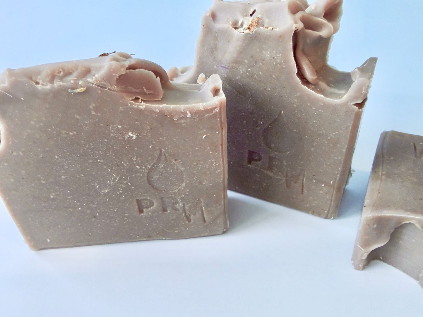 Group of loaf-cut bars arranged together, highlighting hand-cut edges and matte finish