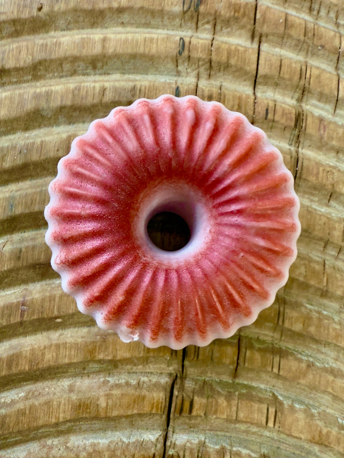 “Cherry solid shampoo bar in ridged donut shape with red merlot mica finish.”