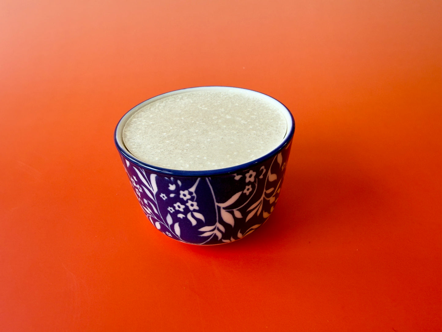Close-up of dish soap surface inside reusable ceramic ramekin