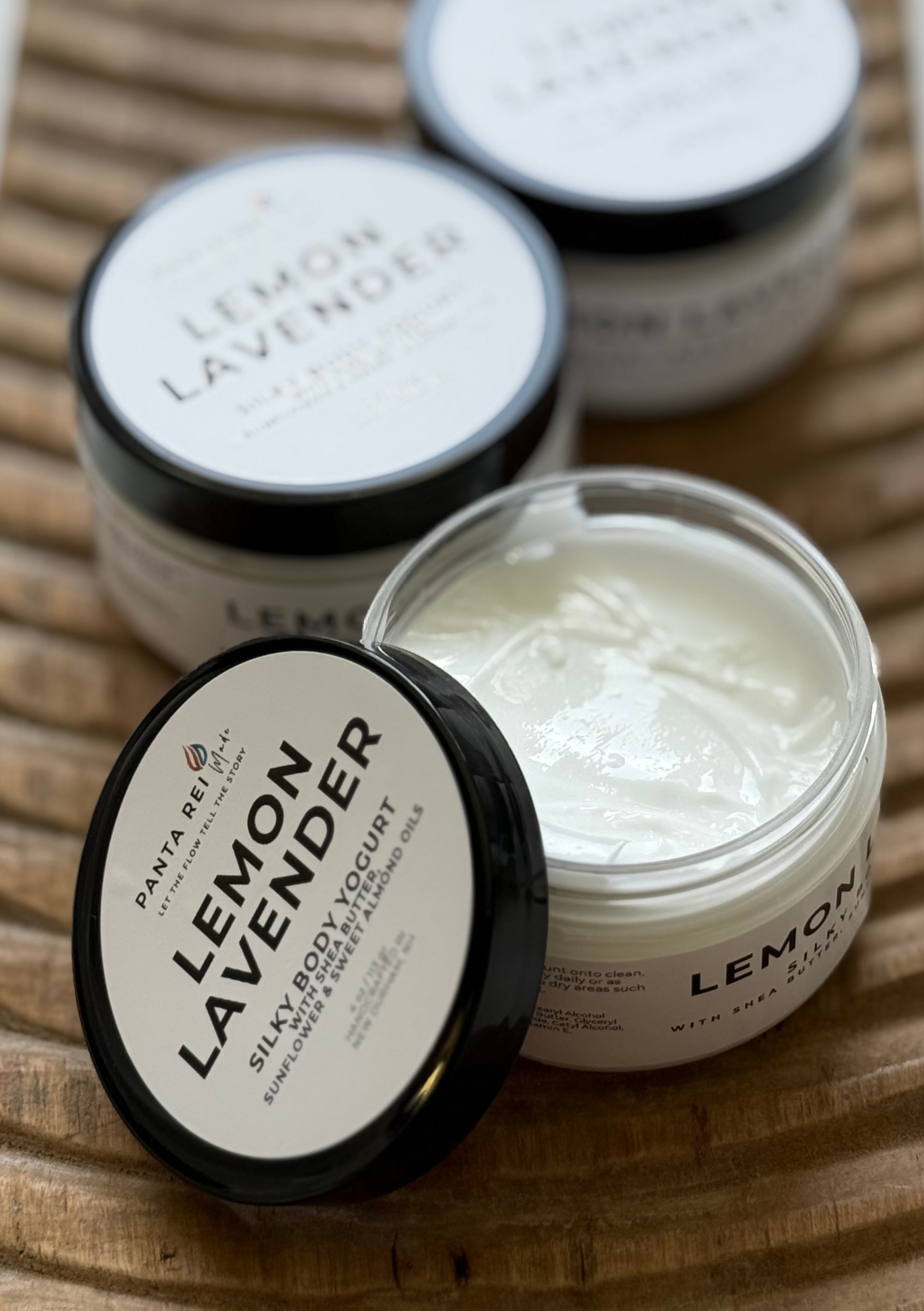 Open jar of Lemon Lavender body yogurt showing the creamy whipped texture.